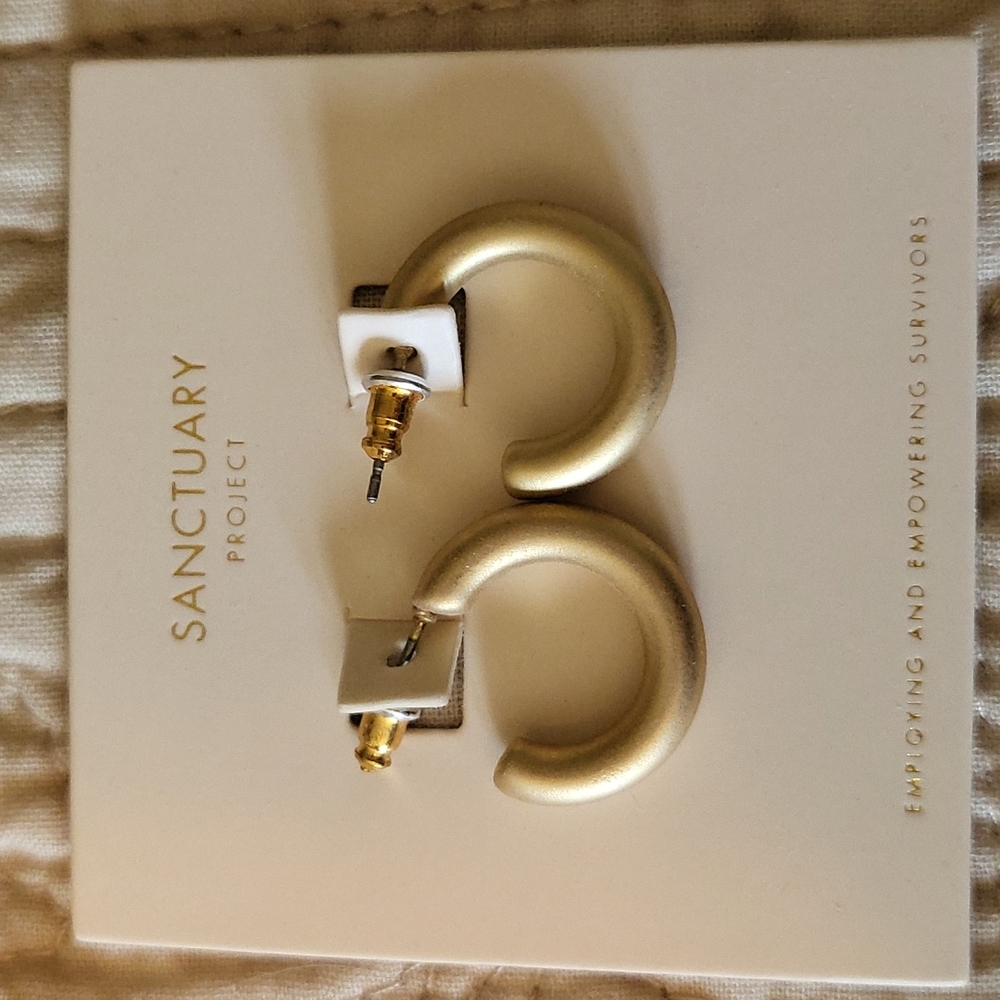 Gold colored earrings